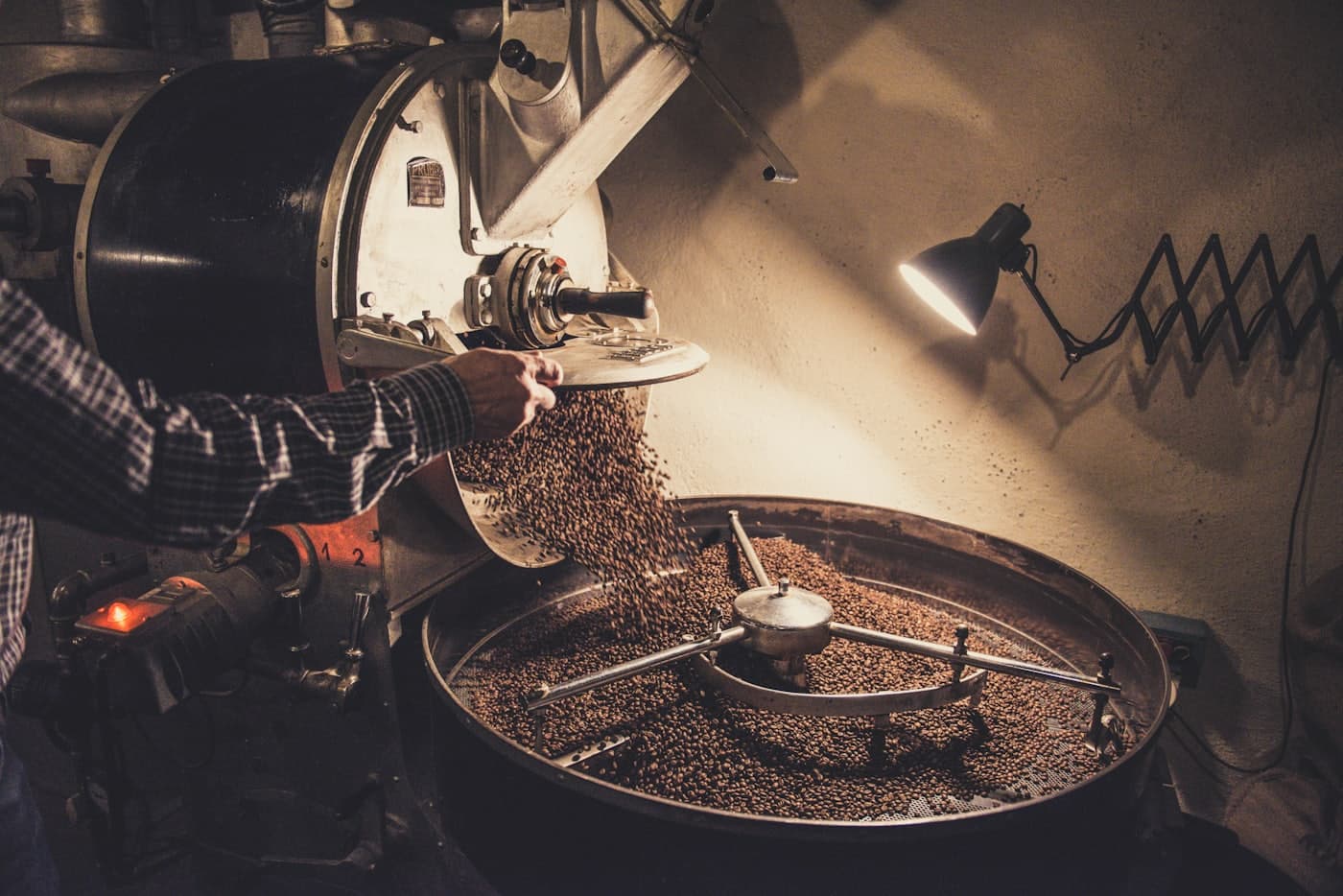 Coffee beans and a roasting machine